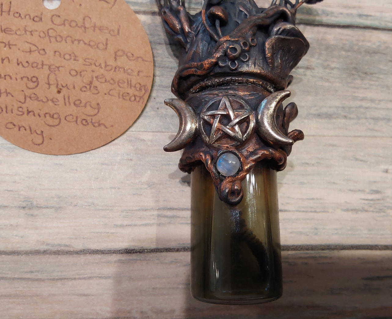 Magical triple moon bubble maker pendant.