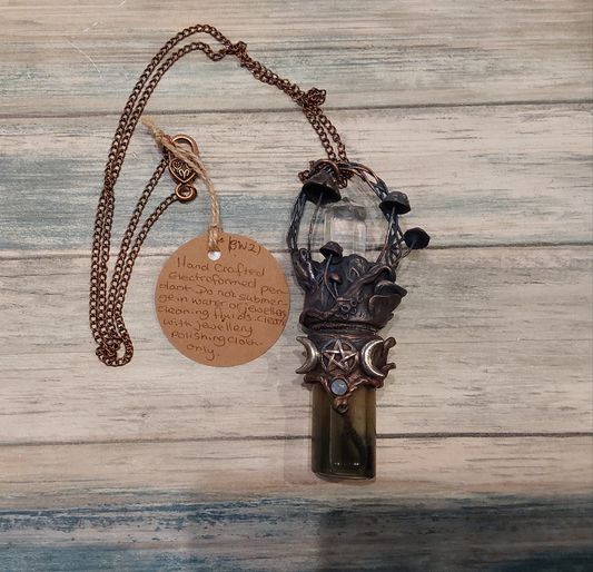Magical triple moon bubble maker pendant.