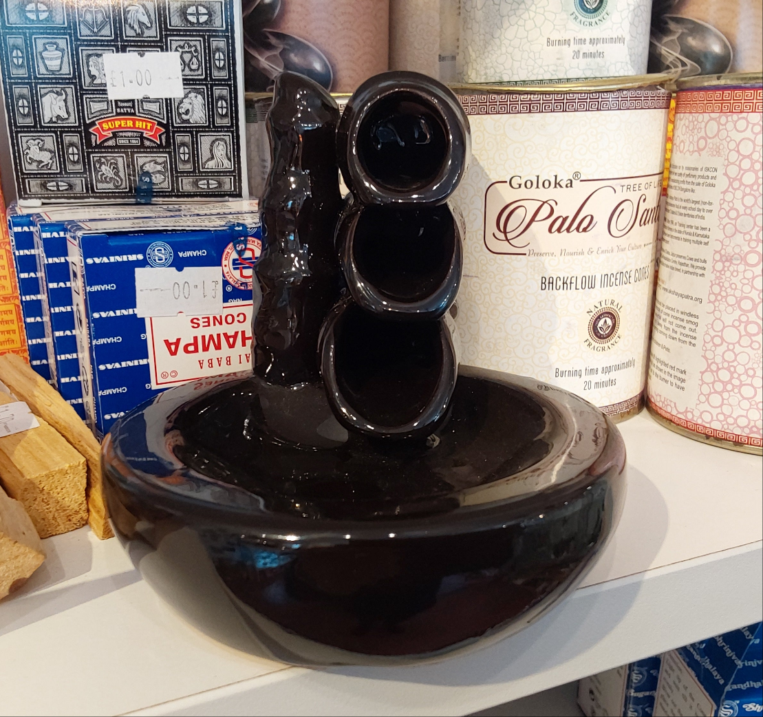 Black Three funnel backflow burner