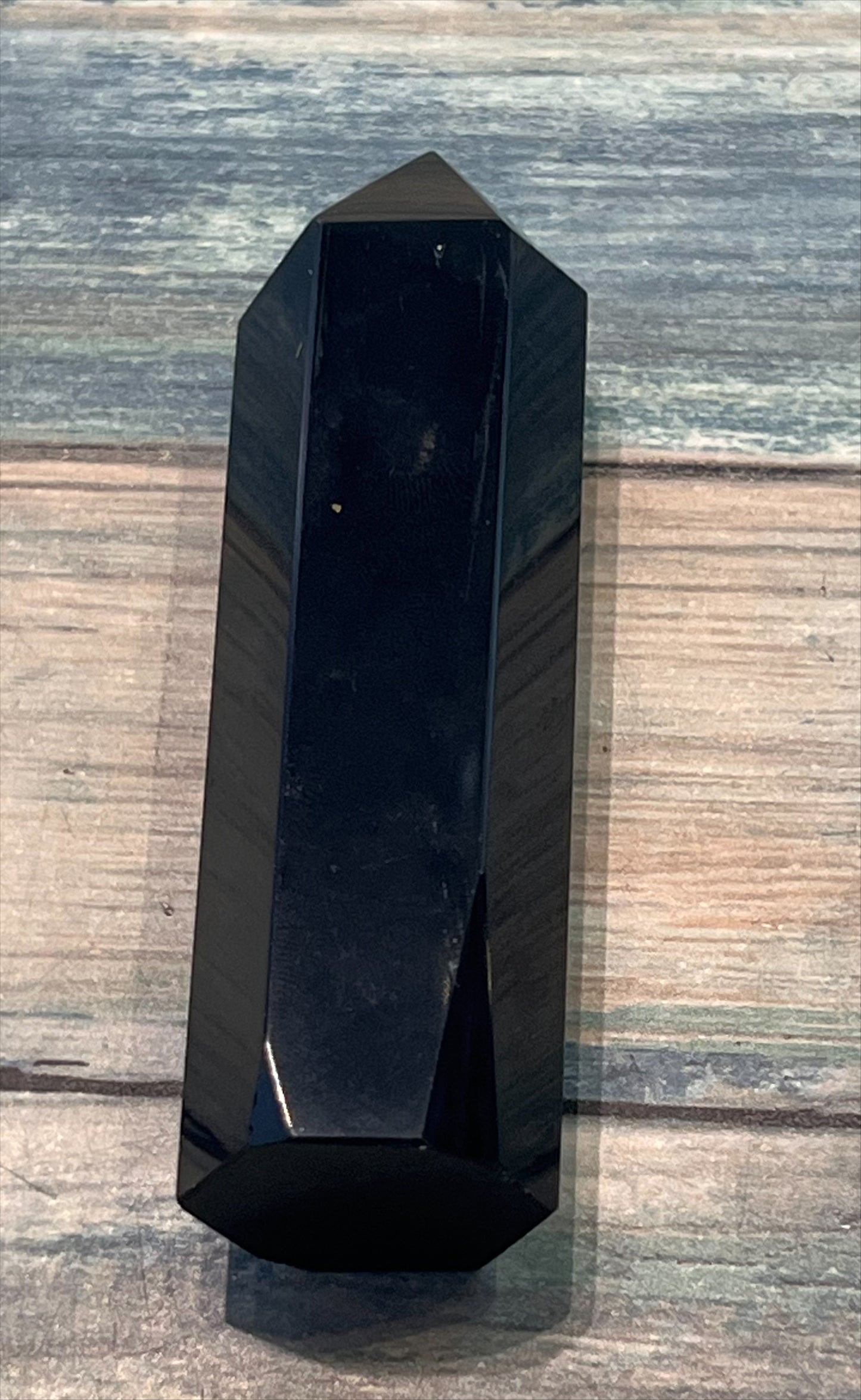 Seven chakra obsidian point