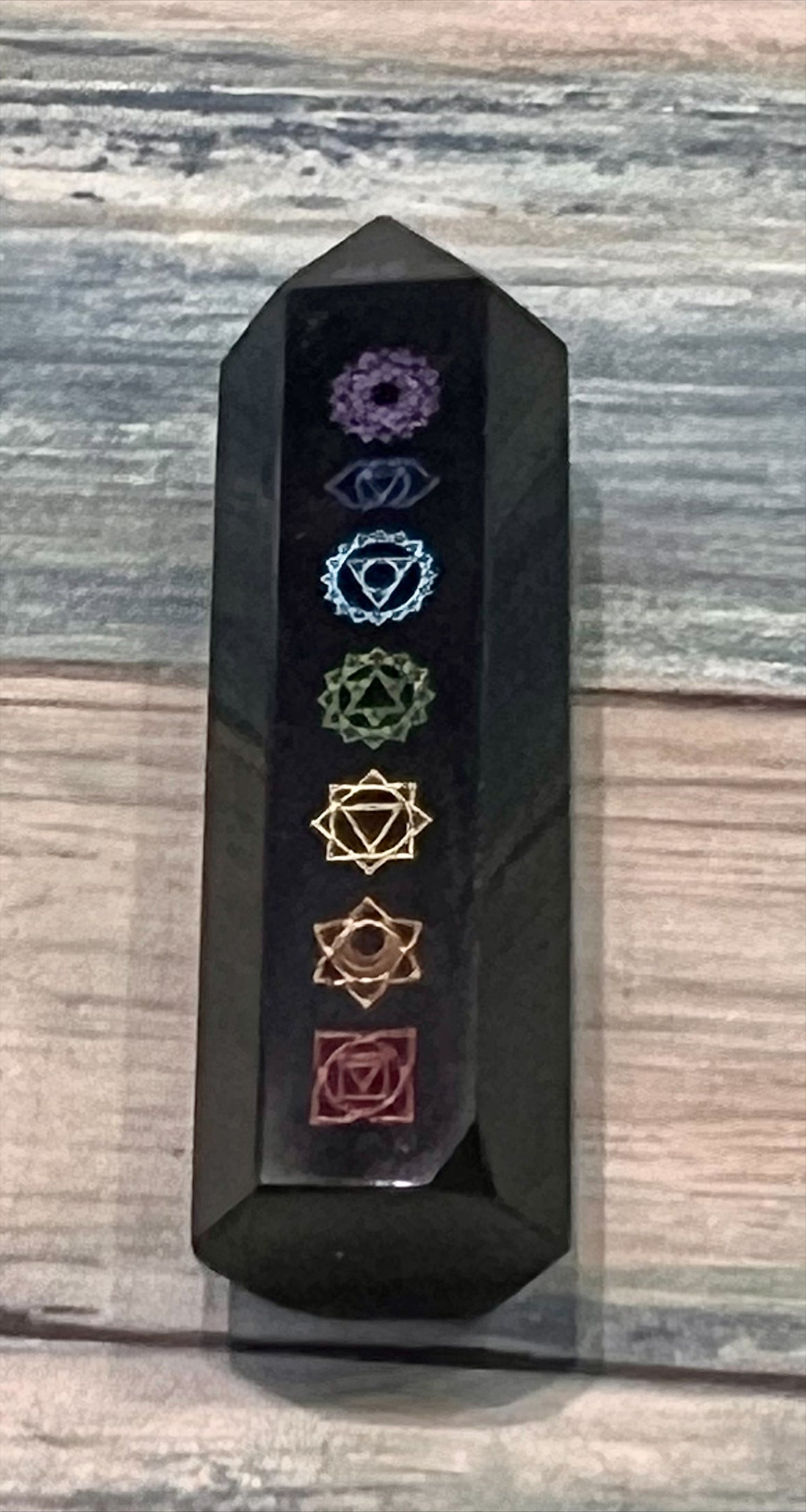 Seven chakra obsidian point